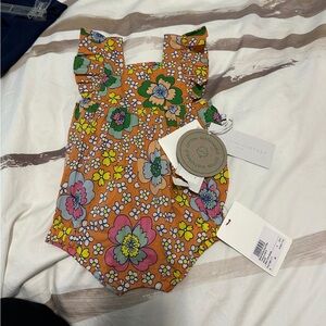Stella McCarthy baby romper